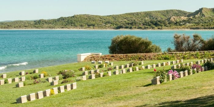 Anzac Cove war cemetery with white headstones overlooking the Aegean Sea at Gallipoli