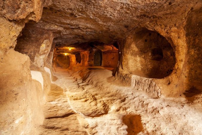 Ozkonak underground city carved niches storage rooms cappadocia