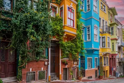 Pastel colored historic houses on a street in Balat Istanbul