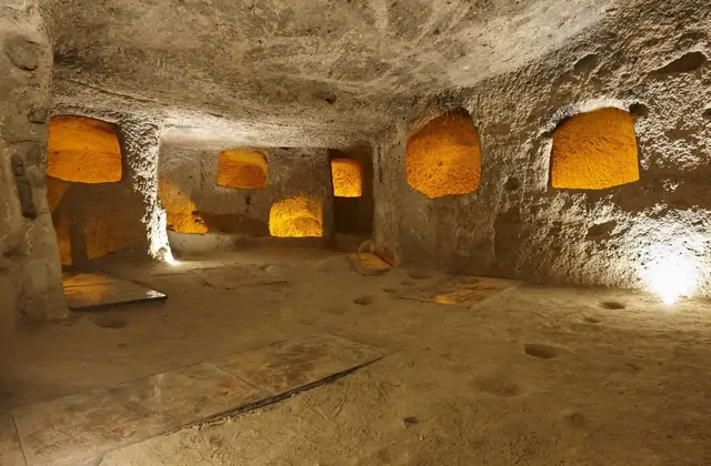 A second-floor passage with access hatches visible in the ceiling at Kaymakli Underground City, visited on the Cappadocia Green Tour. The multi-directional tunnel system allowed for quick movement between levels in this ancient subterranean city in Turkey.